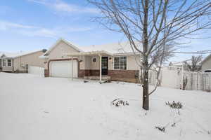 View of front of home featuring a garage