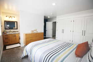 Upstairs Bedroom with En-Suite and Laundry Room, and Two closets