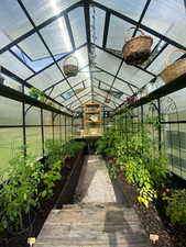 Views of Greenhouse Interior, with Solar Panels