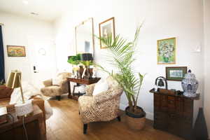 Living area with wood-tile flooring