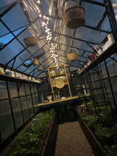 Night time view of Greenhouse, with Solar Panels