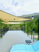 View of Balcony featuring a mountain view to soak up the rays, enjoy the breeze, sipping on a drink