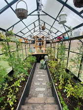 View of Interior of Greenhouse, with Solar Panels