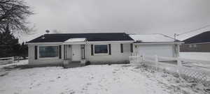 View of front of home featuring a garage