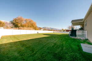 View of yard with a mountain view