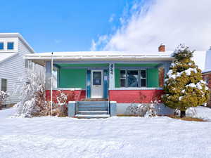 Bungalow-style house with a porch