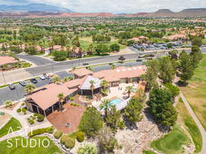 Birds eye view of property with a mountain view