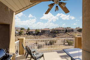 Balcony featuring ceiling fan