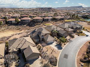 Birds eye view of property featuring a mountain view