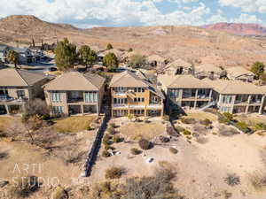 Birds eye view of property featuring a mountain view