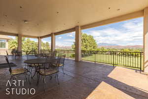 View of patio / terrace with a mountain view