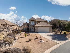 View of property with a garage