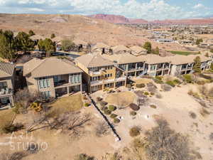 Birds eye view of property featuring a mountain view