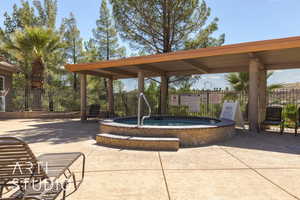 View of patio / terrace with a community hot tub