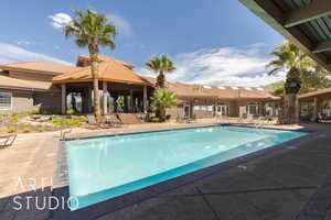 View of swimming pool with a patio