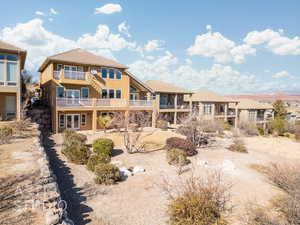 Rear view of house with a balcony