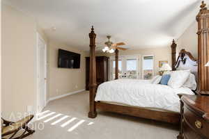 Carpeted bedroom featuring access to outside