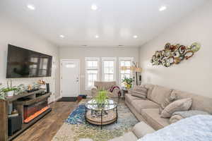 Living room featuring dark hardwood / wood-style floors