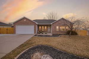 Ranch-style home featuring a garage