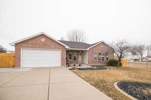 Single story home with a garage