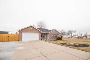 Ranch-style home with a garage