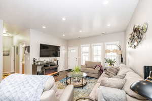 Living room featuring hardwood / wood-style flooring