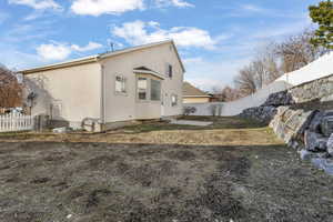 View of home's exterior featuring central AC unit