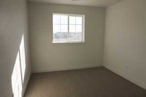 Unfurnished room featuring carpet floors