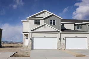 View of front of home featuring a garage