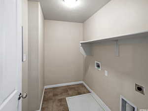 Laundry area with hookup for a washing machine, electric dryer hookup, conveniently located on 2nd floor