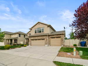 View of front of property featuring 3rd car garage