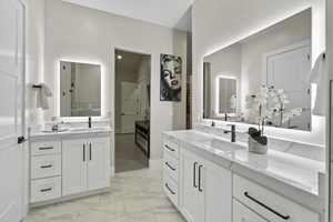 Bathroom with dual vanities