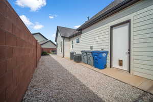 View of property exterior featuring a patio