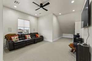 Upstairs family / flex room featuring light carpet and ceiling fan, views.