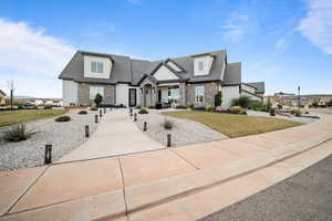 View of front of house with a front lawn