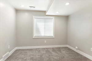 View of carpeted spare room