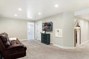 Living room with light colored carpet