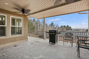 View of patio / terrace featuring ceiling fan and a grill