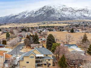 Birds eye view of property with a mountain view