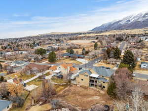 Birds eye view of property with a mountain view