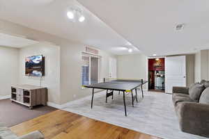 Playroom featuring light wood-type flooring