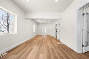 Interior space with light hardwood / wood-style flooring