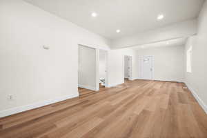 Unfurnished room featuring light wood-type flooring