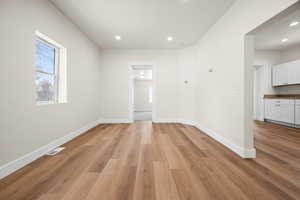 Empty room with light wood-type flooring