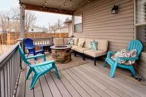 Deck featuring an outdoor covered living space