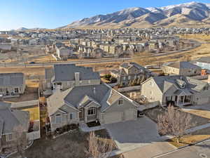 Birds eye view of property with a mountain view