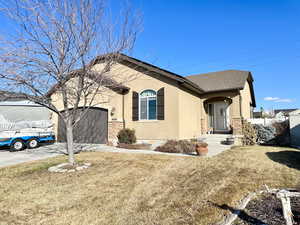 View of front of house with a front lawn