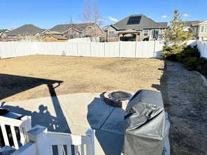 View of yard featuring a fire pit