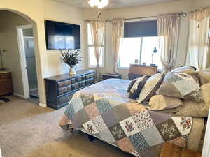 View of carpeted bedroom