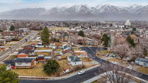 Birds eye view of property featuring a mountain view